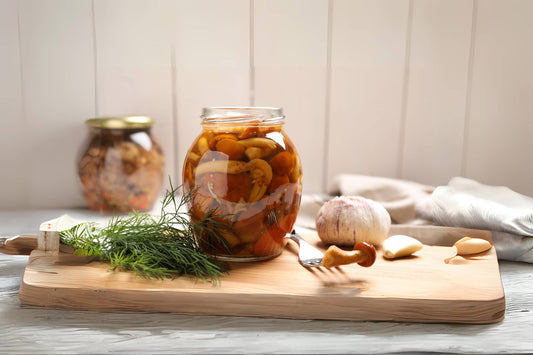 Mushrooms in a jar filled with oil