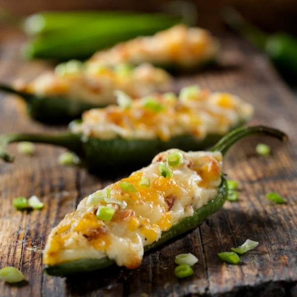 Stuffed peppers on a wooden palette