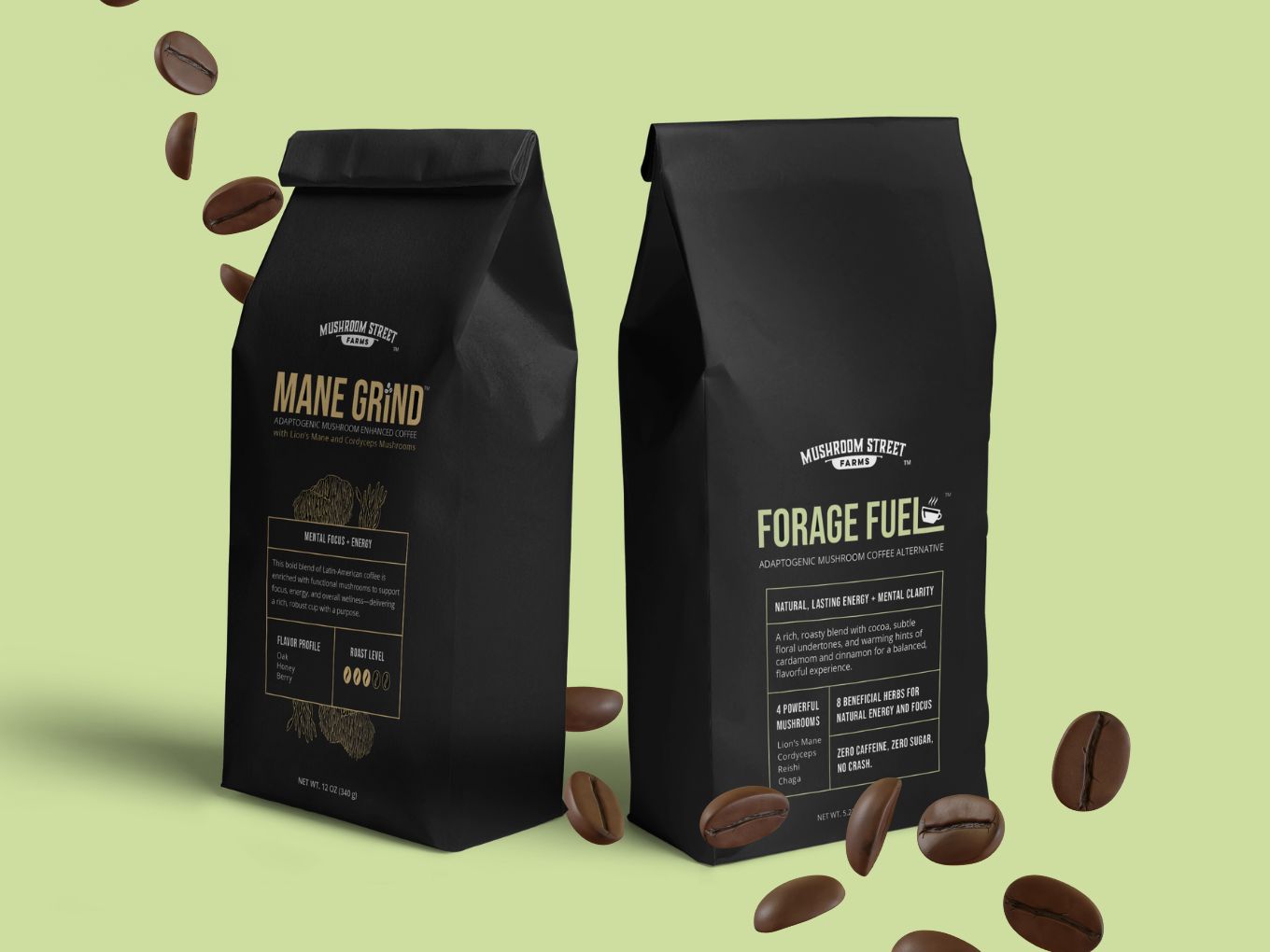 Bags of Mane Grind and Forage Fuel mushroom coffee with roasted coffee beans scattered around them