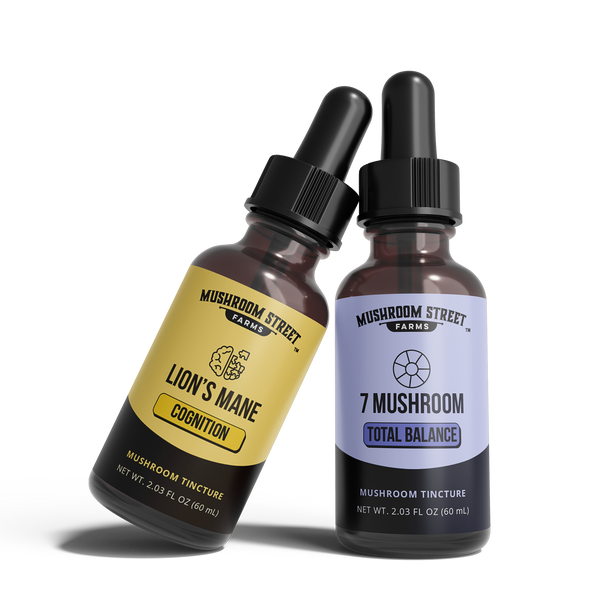 Two mushroom tincture bottles from Mushroom Street Farms on a white background