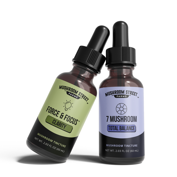 Two Mushroom Street Farms tincture bottles on a white background
