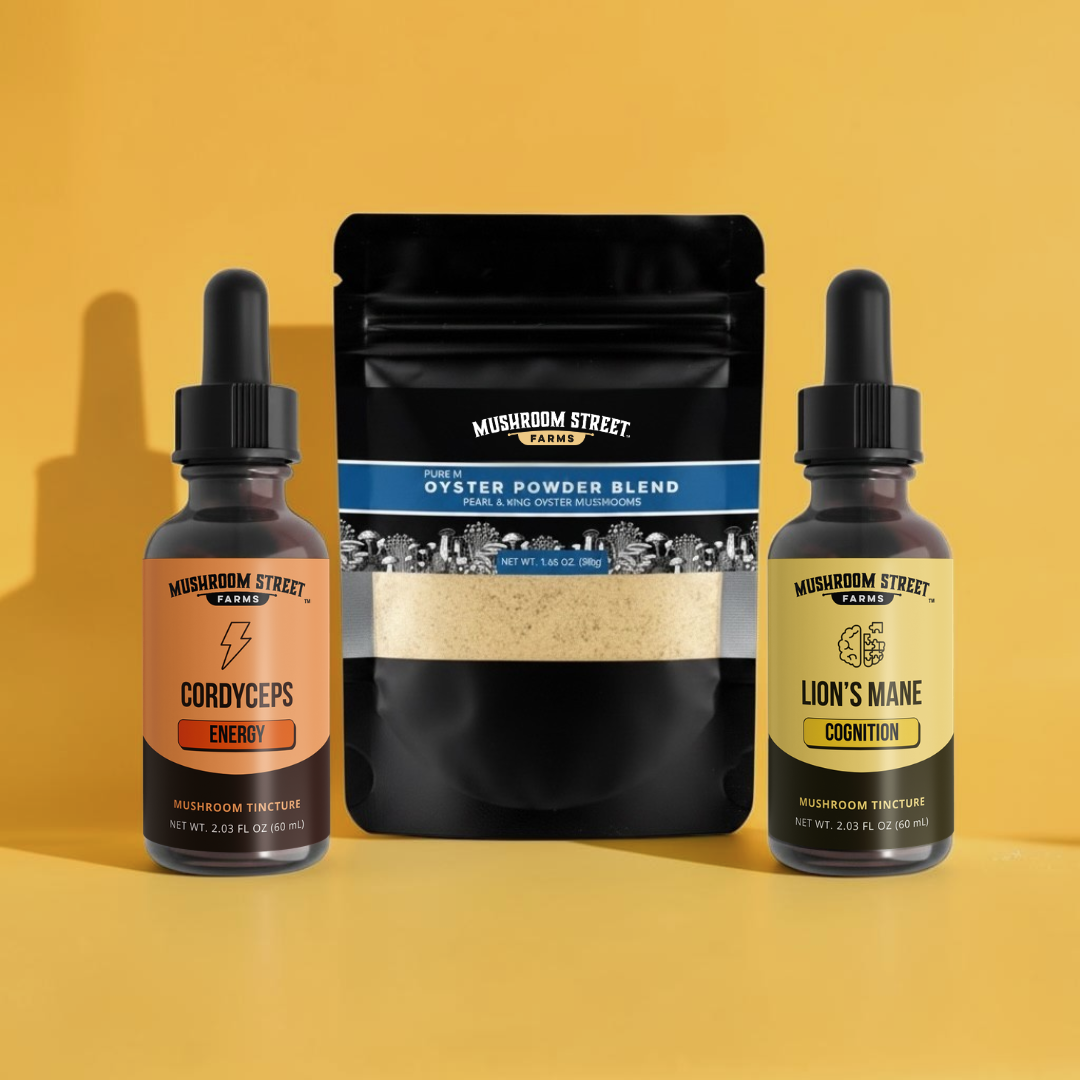 Cordyceps and Lion's Mane tincture bottles beside a pouch of Oyster Powder Blend on a golden yellow background